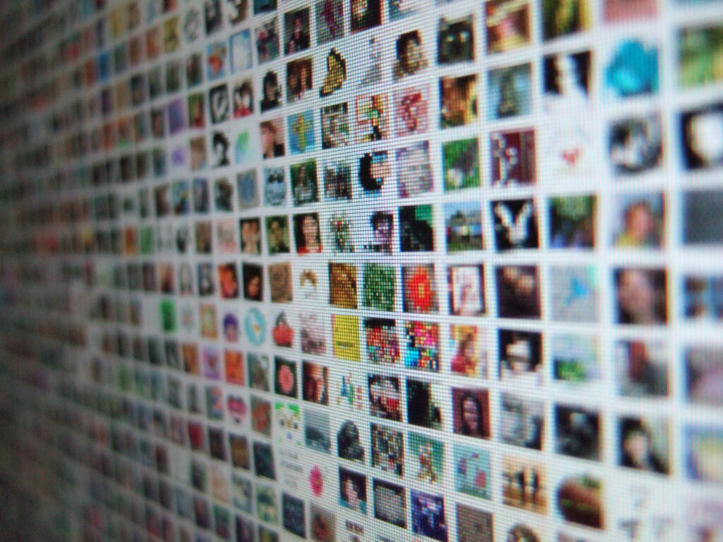 A picture of a pixelated screen featuring avatar images for Etsy users.