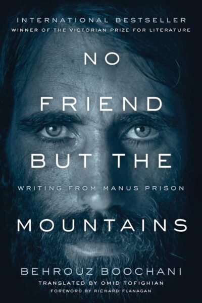 Book cover of No Friend but the Mountains by Behrouz Boochani, featuring a dark blue background with abstract mountain-like shapes and the title in bold white and blue text.