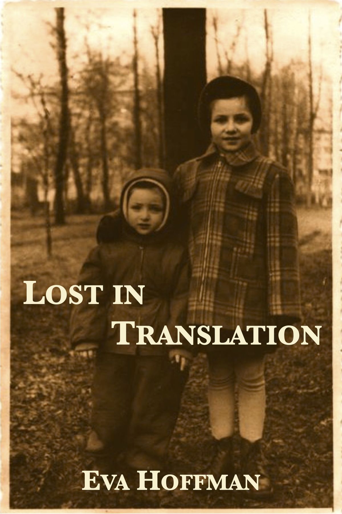 Sepia-toned cover of Lost in Translation: A Life in a New Language by Eva Hoffman showing two young girls standing outdoors in coats with bare trees behind them.