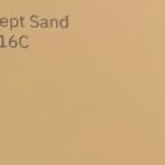 Paint chip labeled "Sunswept Sand"